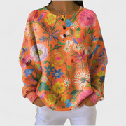 Gerhild | Pullover mit Blüten auf Koralle